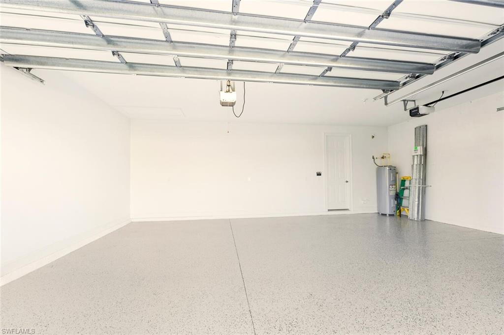 28049 Captiva Shell Loop Bonita Springs, FL 34135 - Photo 39 of 50 a view of a room with racks on the wall