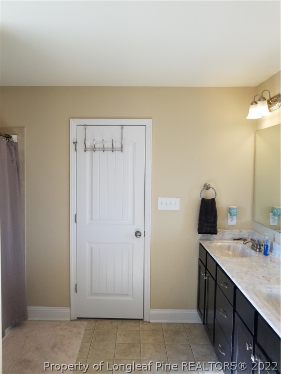 3720 Thrower Road Hope Mills, NC 28348 - Photo 15 of 26 a view of bathroom with dual sinks