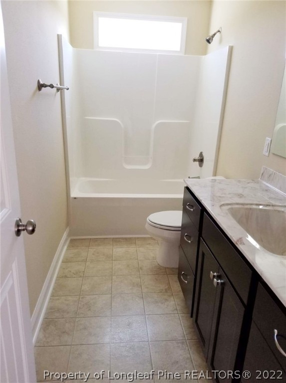3720 Thrower Road Hope Mills, NC 28348 - Photo 22 of 26 a bathroom with a granite countertop sink toilet and shower