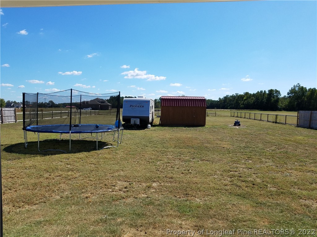 3720 Thrower Road Hope Mills, NC 28348 - Photo 23 of 26 a view of a lake with outdoor space