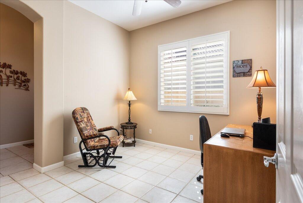 49562 Wayne Street Indio, CA 92201 - Photo 15 of 52 a living room with furniture and a window