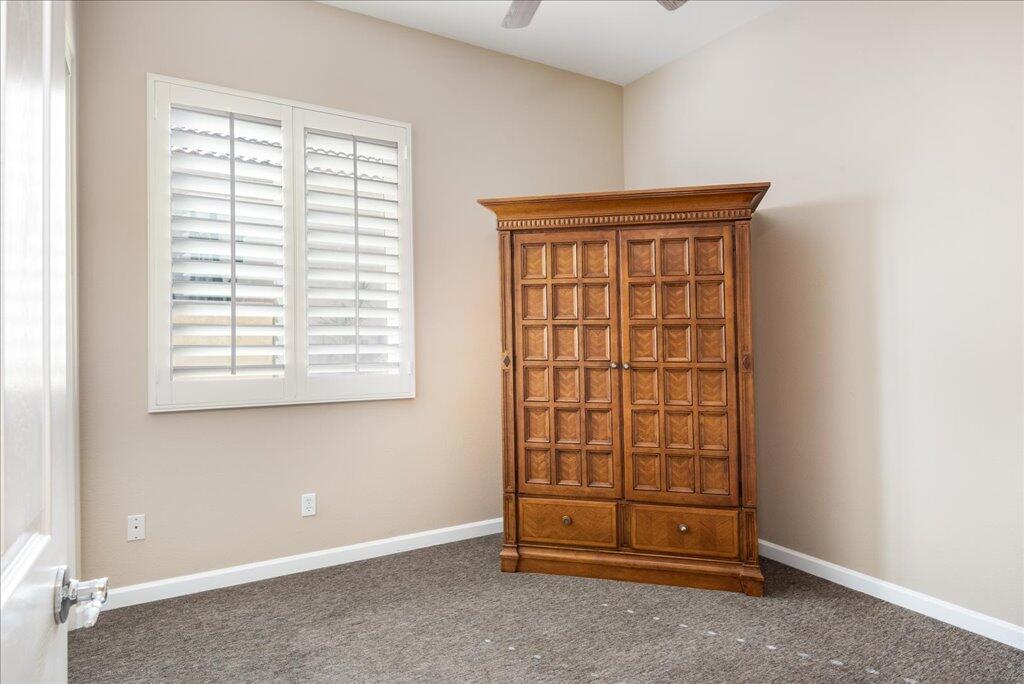 49562 Wayne Street Indio, CA 92201 - Photo 18 of 52 a view of an empty room with a window