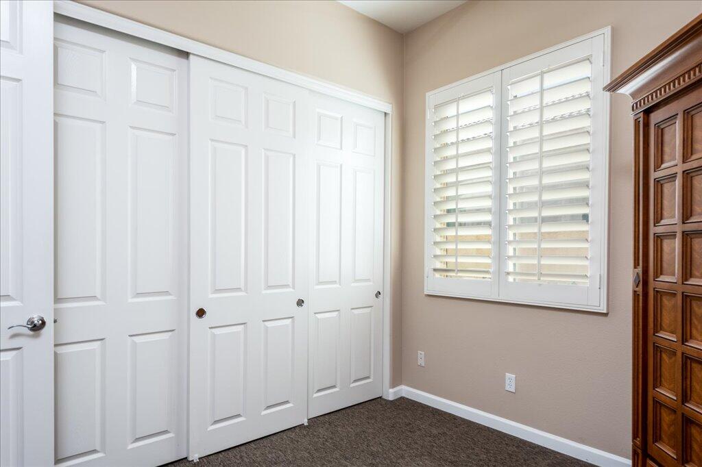 49562 Wayne Street Indio, CA 92201 - Photo 19 of 52 a view of an empty room with a window