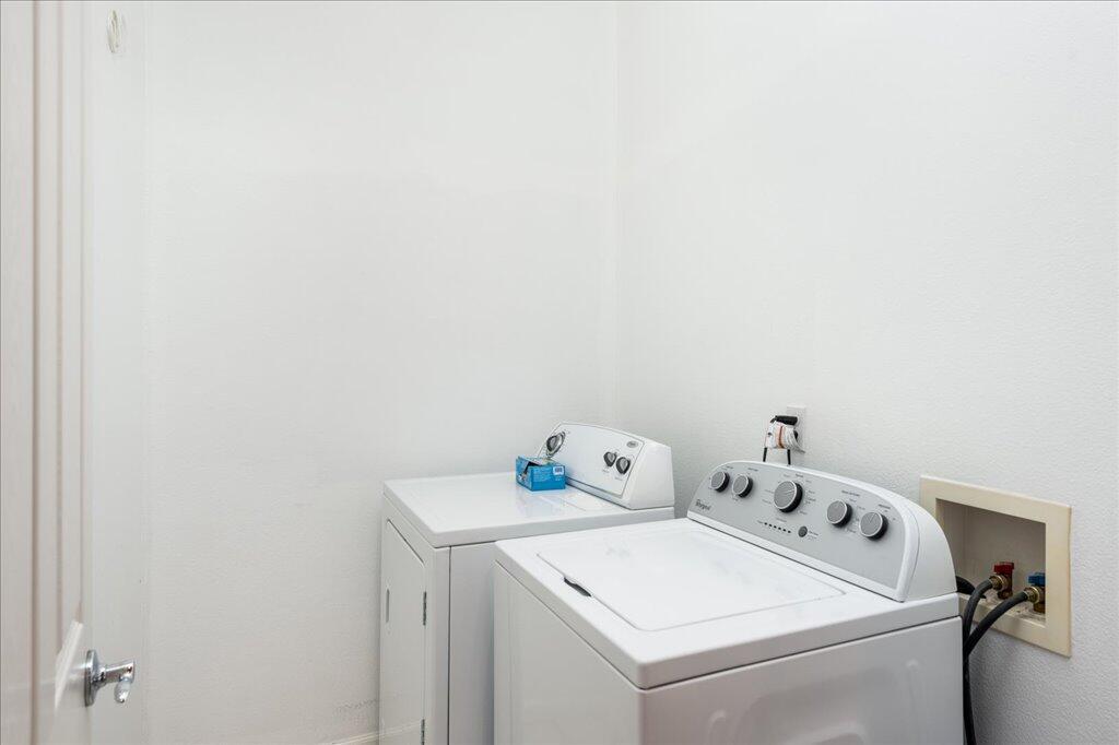 49562 Wayne Street Indio, CA 92201 - Photo 21 of 52 a utility room with dryer and washer