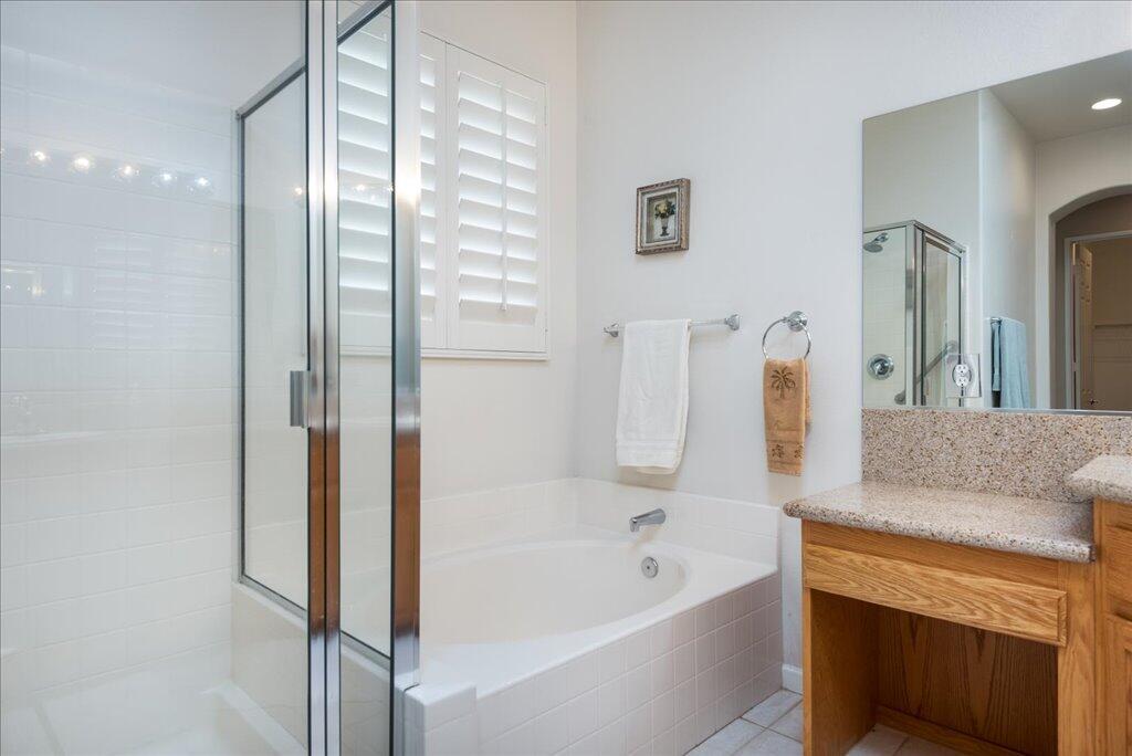49562 Wayne Street Indio, CA 92201 - Photo 28 of 52 a bathroom with a bathtub and a sink