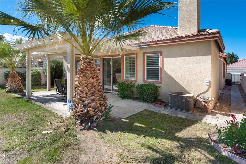 49562 Wayne Street Indio, CA 92201 - Photo 34 of 52 a view of a house with a patio