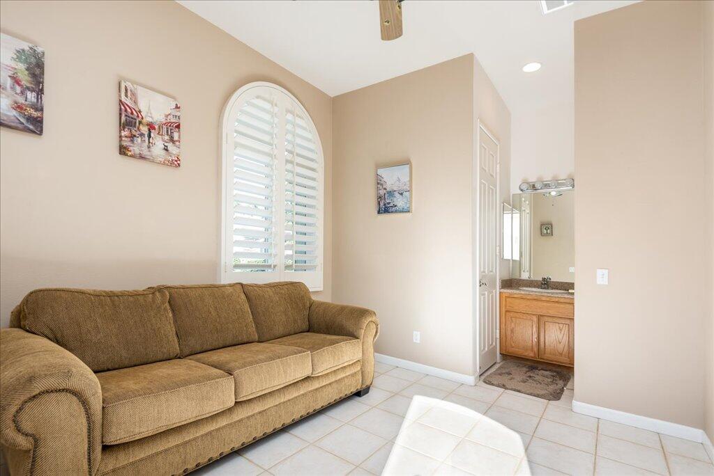 49562 Wayne Street Indio, CA 92201 - Photo 37 of 52 a living room with furniture and a window