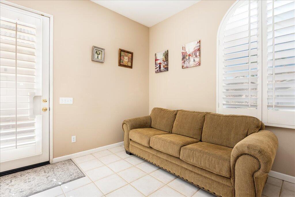 49562 Wayne Street Indio, CA 92201 - Photo 38 of 52 a living room with furniture and a window