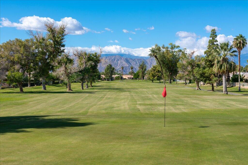 49562 Wayne Street Indio, CA 92201 - Photo 46 of 52 a view of a playground with basketball court
