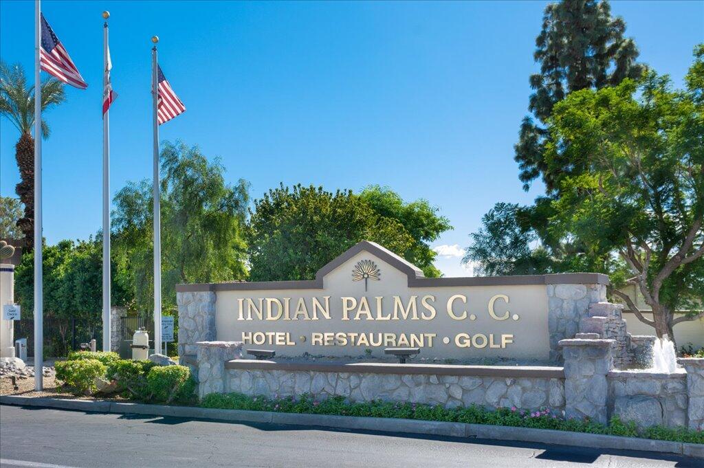 49562 Wayne Street Indio, CA 92201 - Photo 52 of 52 a view of a street sign under a large tree
