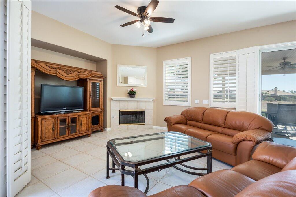49562 Wayne Street Indio, CA 92201 - Photo 7 of 52 a living room with furniture and a flat screen tv