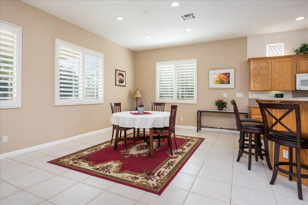 49562 Wayne Street Indio, CA 92201 - Photo 8 of 52 a view of a dining room with furniture