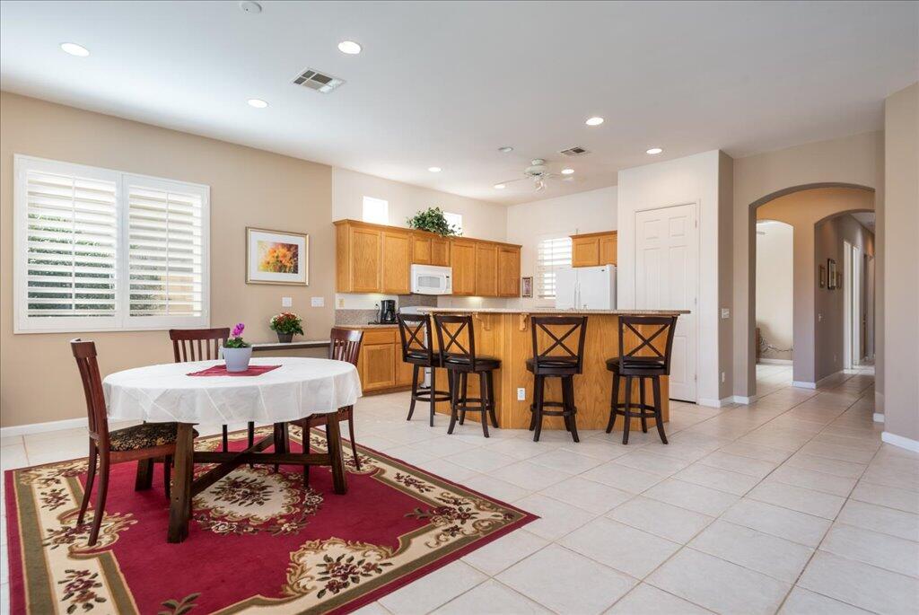 49562 Wayne Street Indio, CA 92201 - Photo 9 of 52 a view of a dining room with furniture
