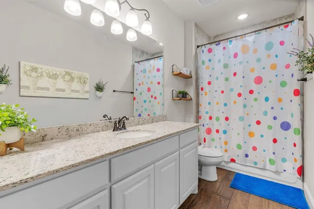 a house with swimming pool in front of it