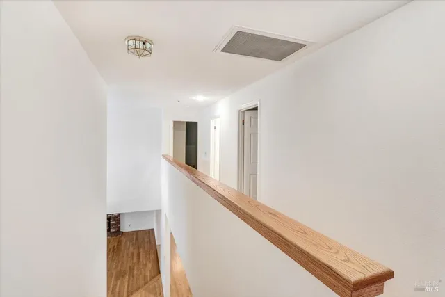 a view of hallway with stairs