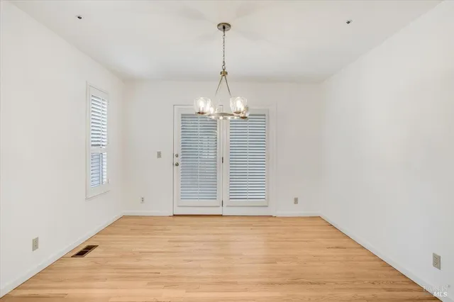 a view of a room with windows