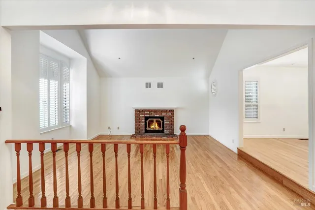 a front view of a house with wooden floor