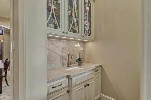 a kitchen with stainless steel appliances granite countertop a stove and cabinets