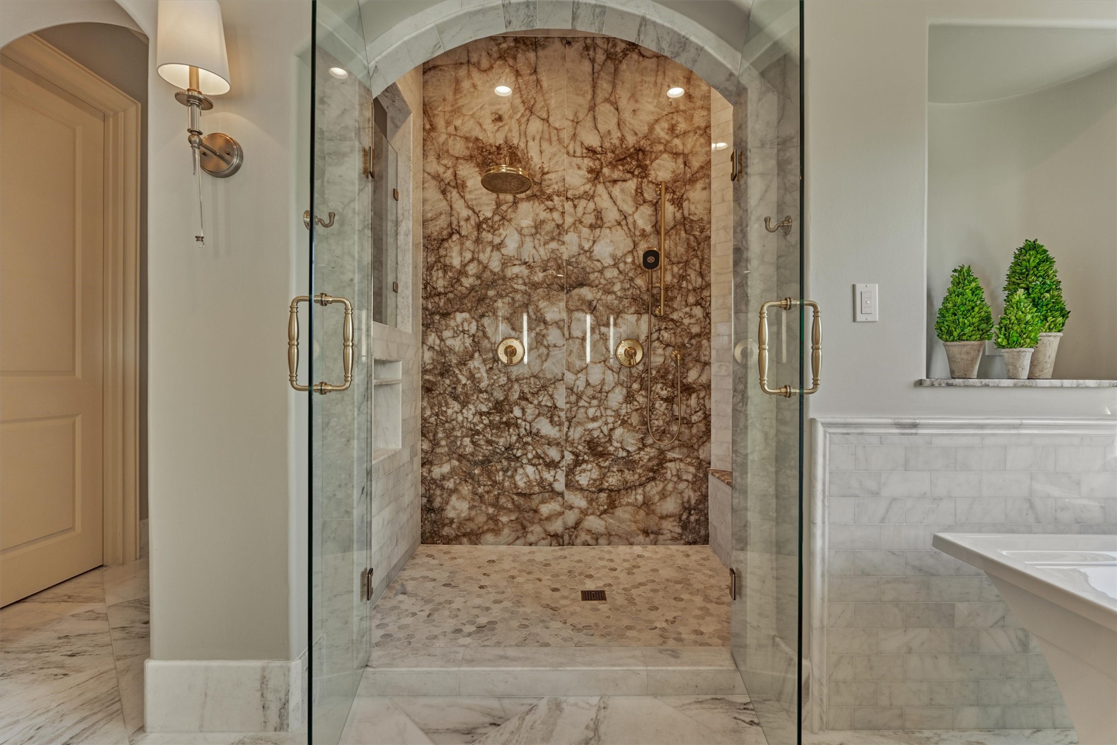 3 Dorset Square Spring, TX 77381 - Photo 24 of 50 Double doors open to a luxurious shower with rain head and hand held.