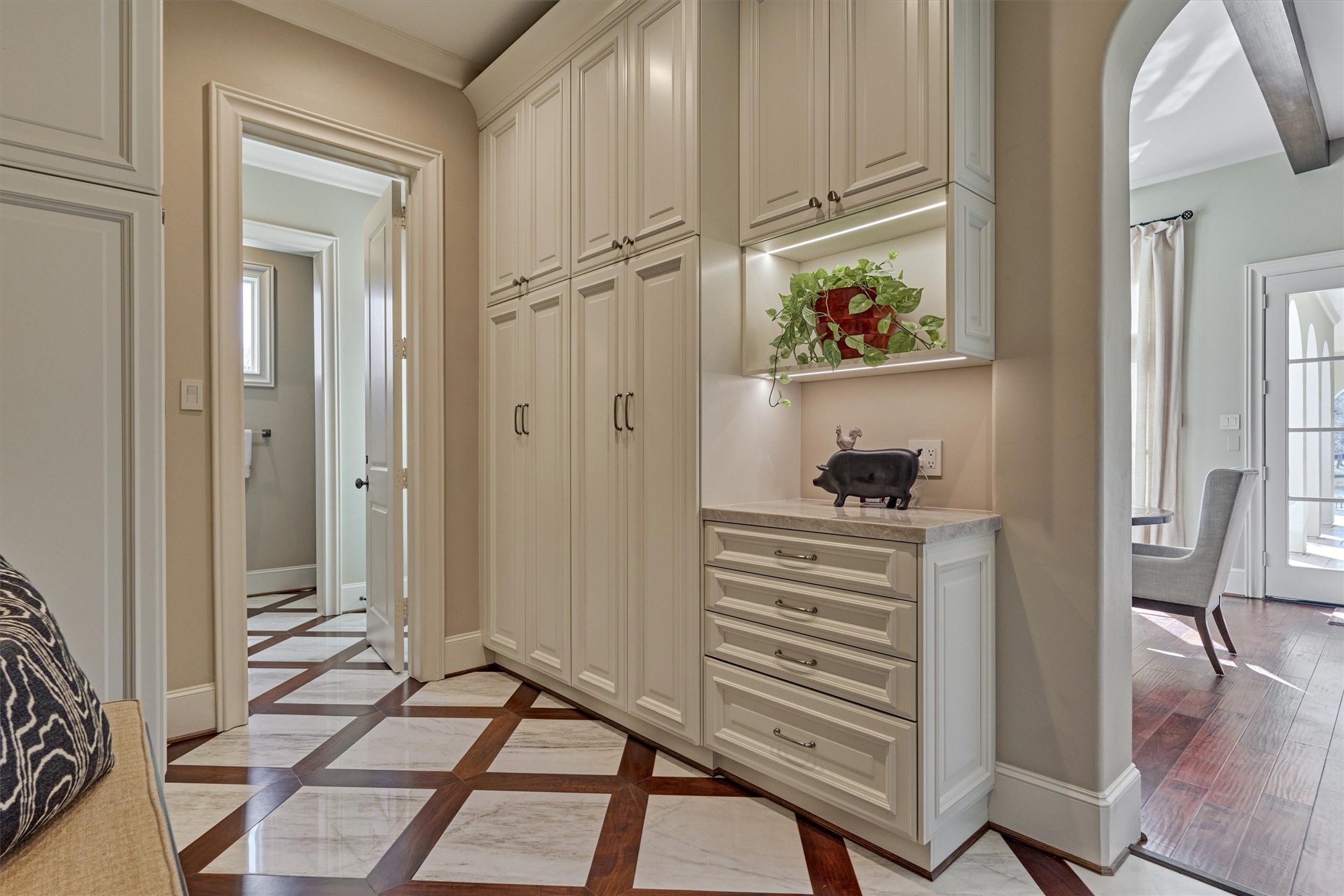 3 Dorset Square Spring, TX 77381 - Photo 33 of 50 Extensive storage throughout, including this large mud space. Bench seating, under counter lighting & drop space on counter. Access to pool bath, back yard and garage.
