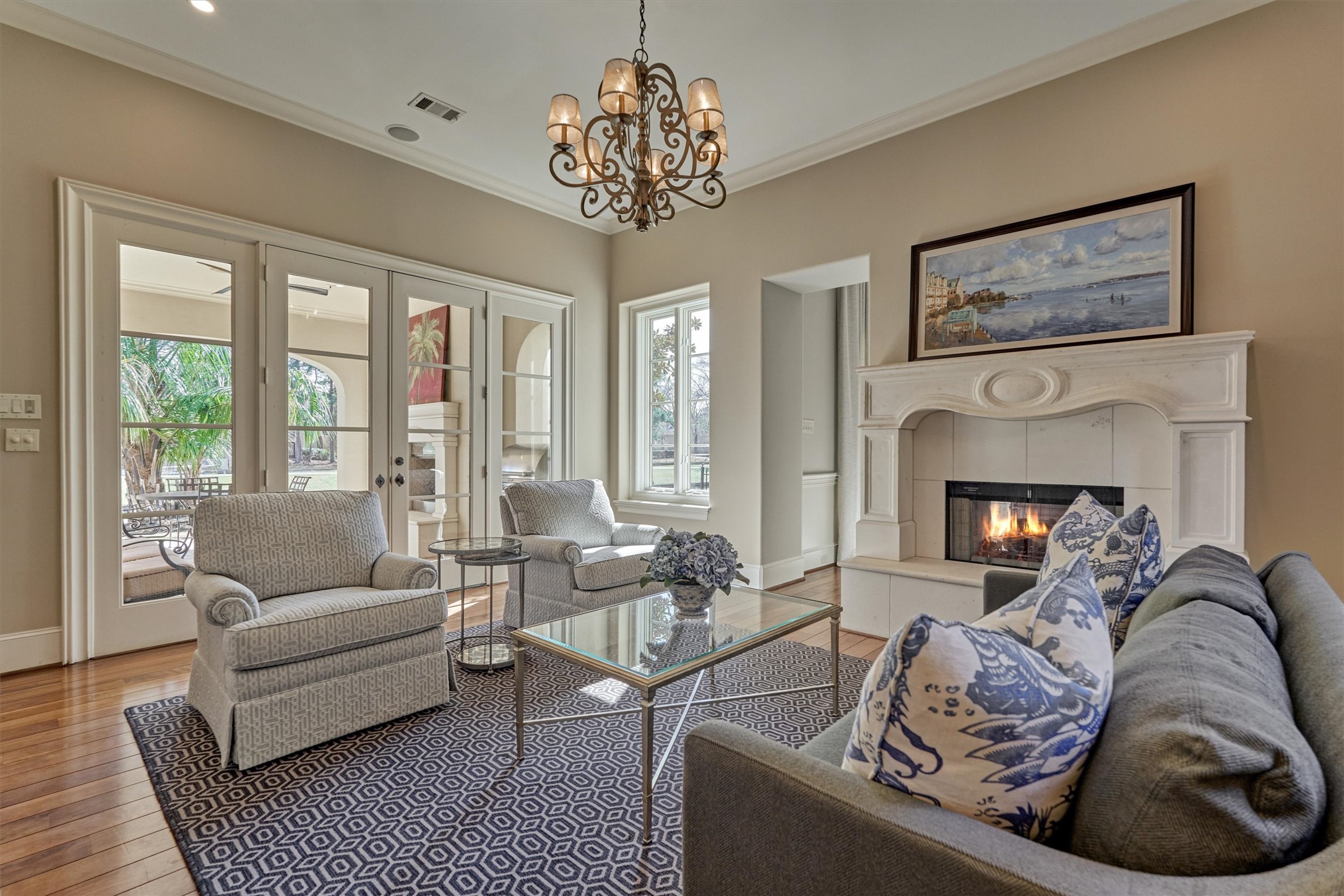 3 Dorset Square Spring, TX 77381 - Photo 6 of 50 Game room or formal living space on main level. Perfect for entertaining. Includes access to patio/pool and wet bar. An abundance of designer selections and upgrades throughout. Photo is virtually staged/enhanced.