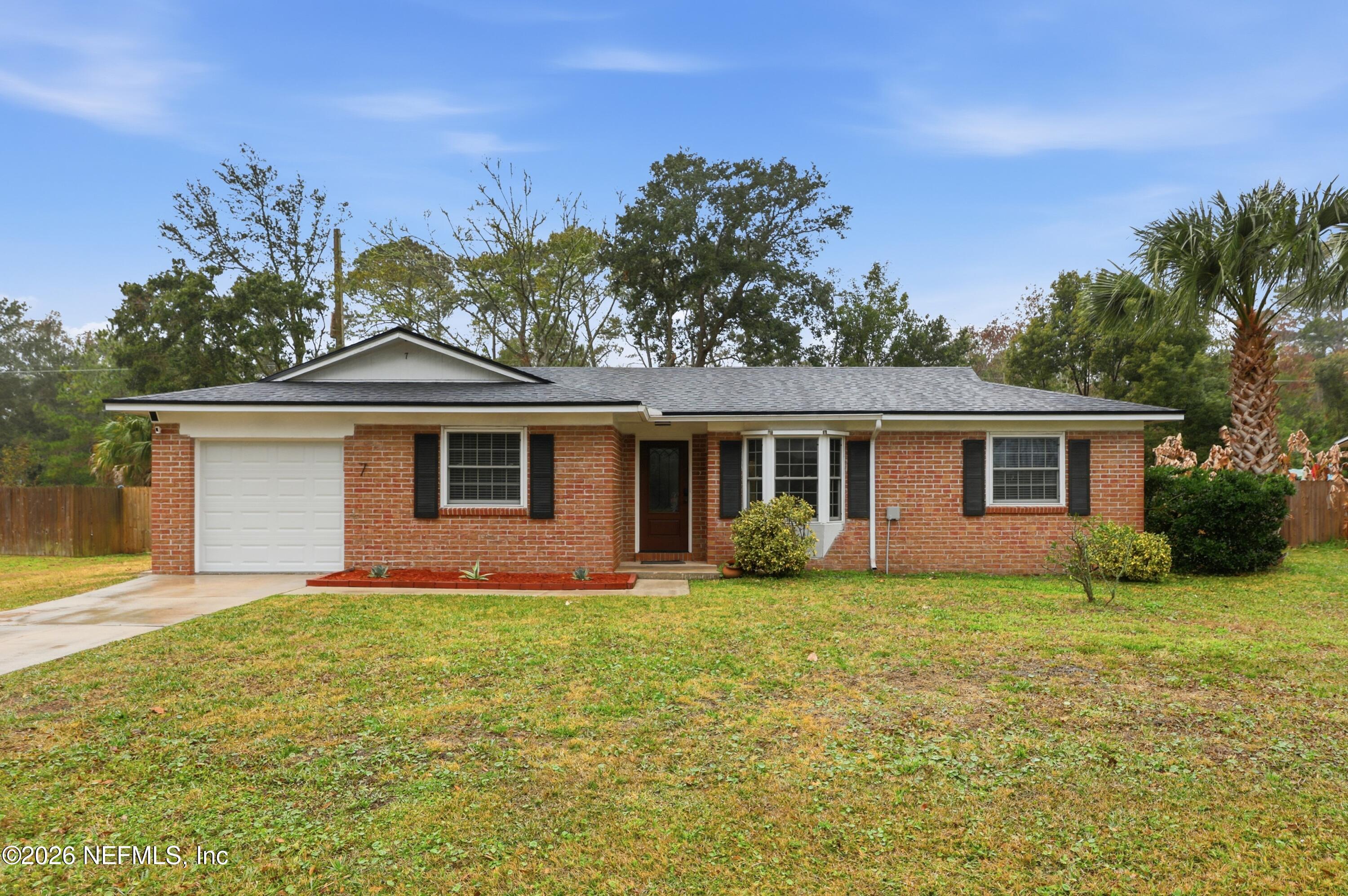 7 Cobia Street Ponte Vedra Beach, FL 32082 - Photo 1 of 20 a front view of house with yard and green space