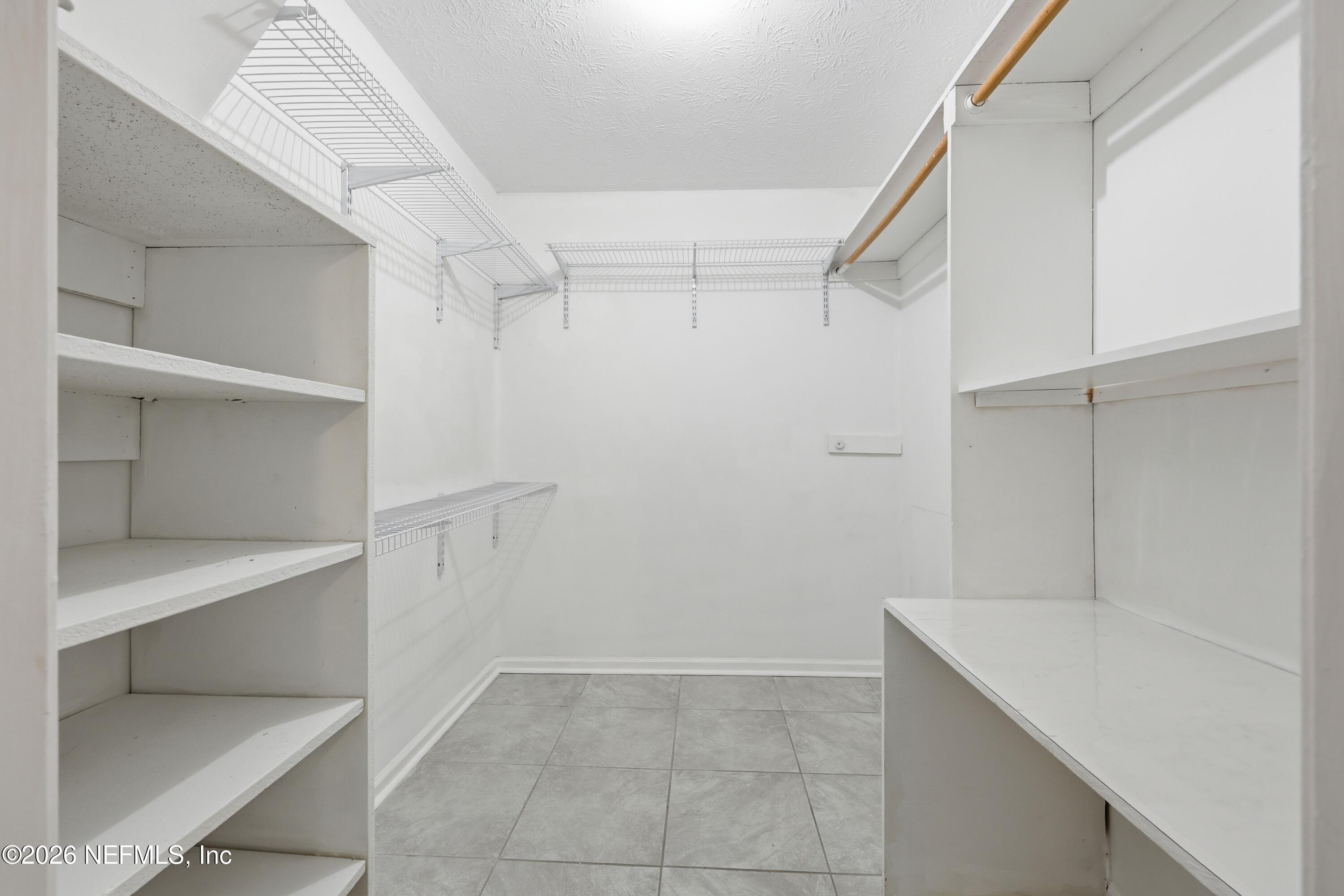 7 Cobia Street Ponte Vedra Beach, FL 32082 - Photo 11 of 20 a view of an empty walk in closet
