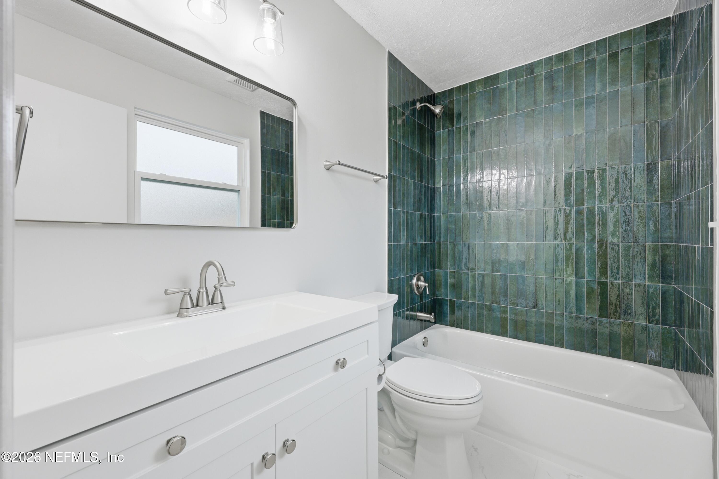 7 Cobia Street Ponte Vedra Beach, FL 32082 - Photo 13 of 20 a bathroom with a sink a toilet and shower