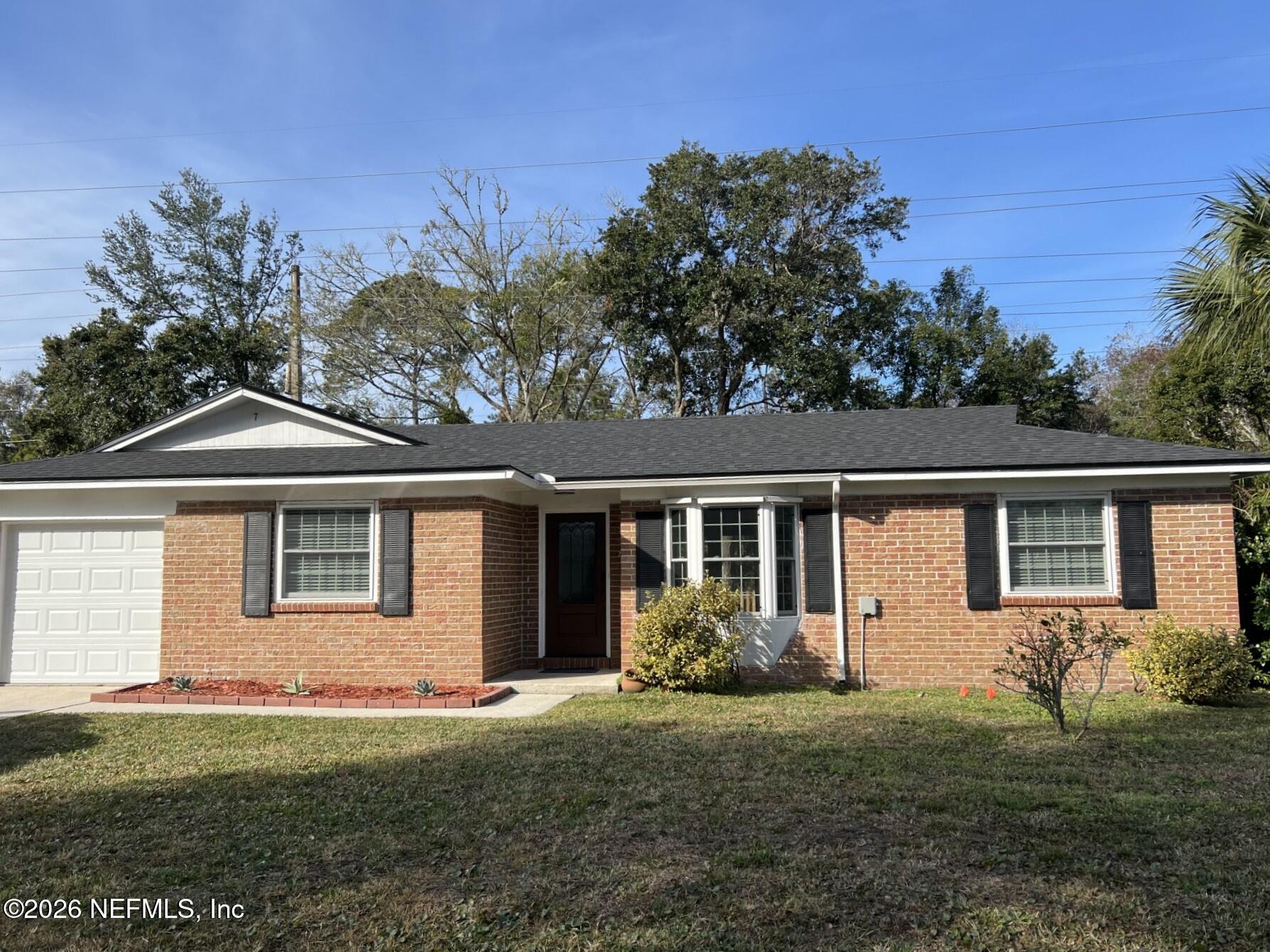 7 Cobia Street Ponte Vedra Beach, FL 32082 - Photo 2 of 20 front view of house with a yard