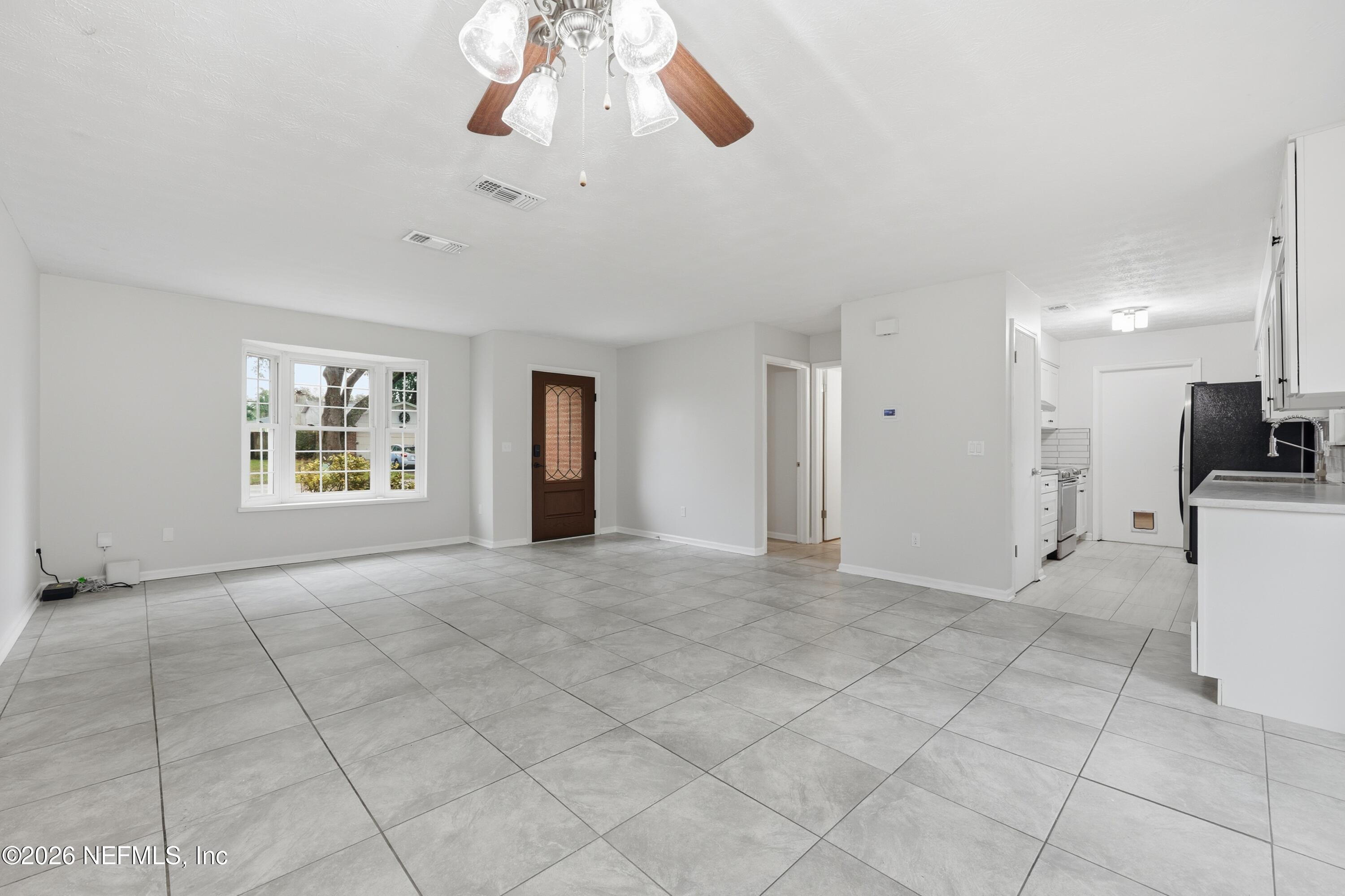 7 Cobia Street Ponte Vedra Beach, FL 32082 - Photo 5 of 20 a view of an empty room with a window