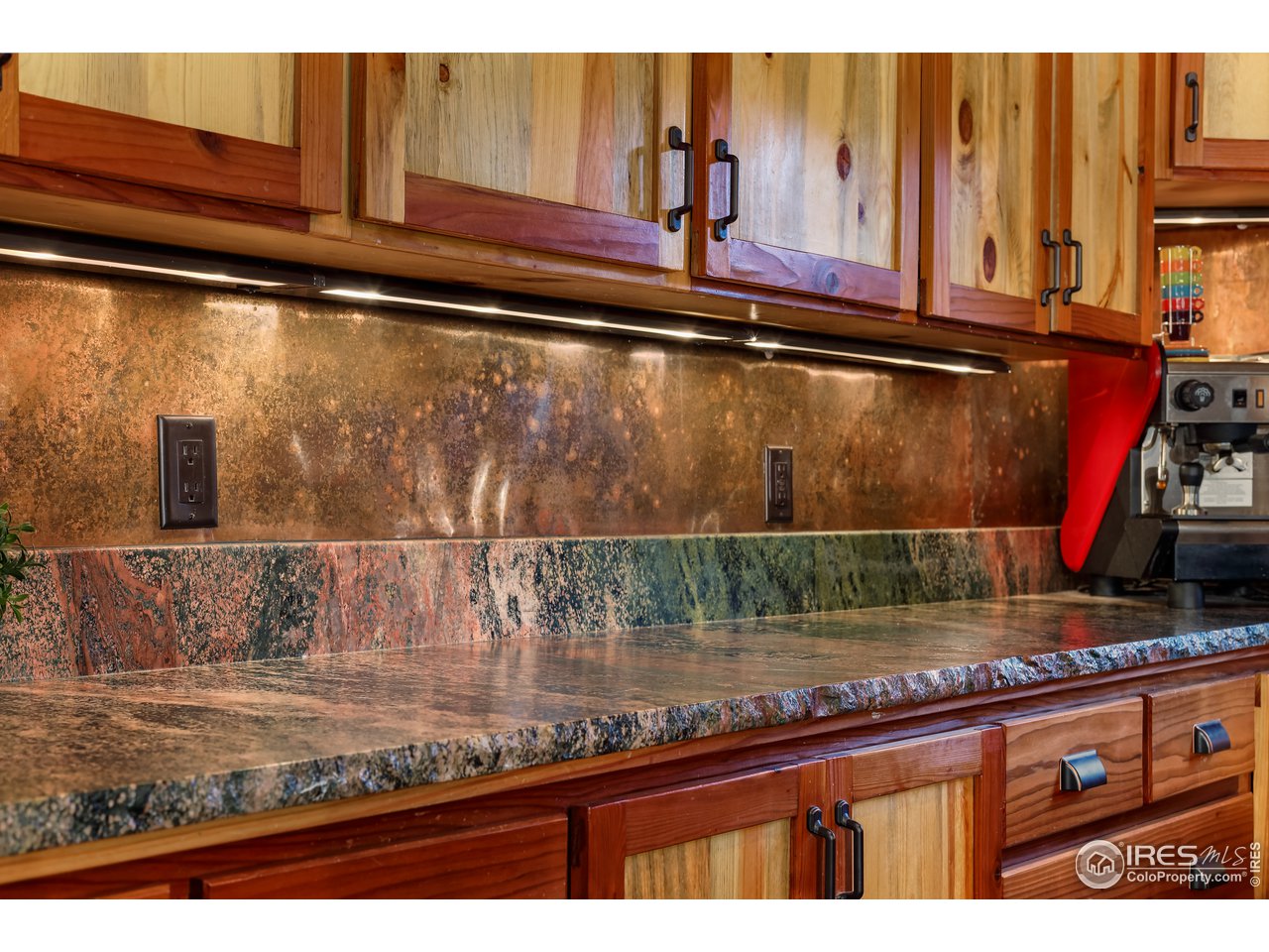 381 Wichita Road Lyons, CO 80540 - Photo 8 of 40 Granite live edge counters and copper backsplash