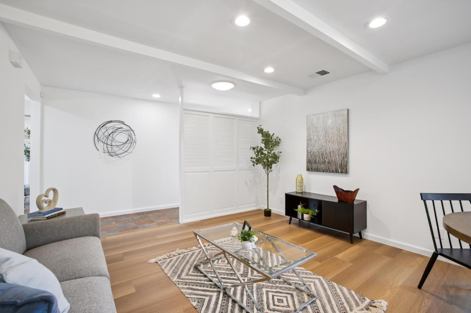 32402 Rutherford Lane Union City, CA 94587 - Photo 15 of 55 a living room with furniture a rug and a table