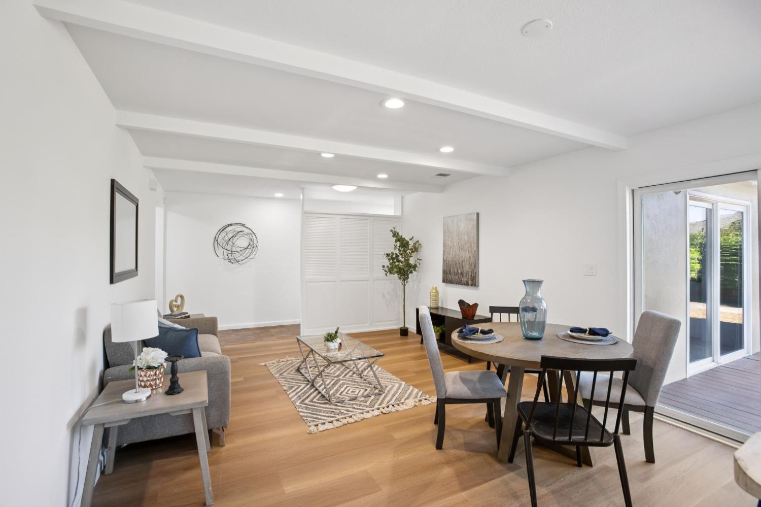 32402 Rutherford Lane Union City, CA 94587 - Photo 17 of 55 a view of a dining room with furniture and wooden floor