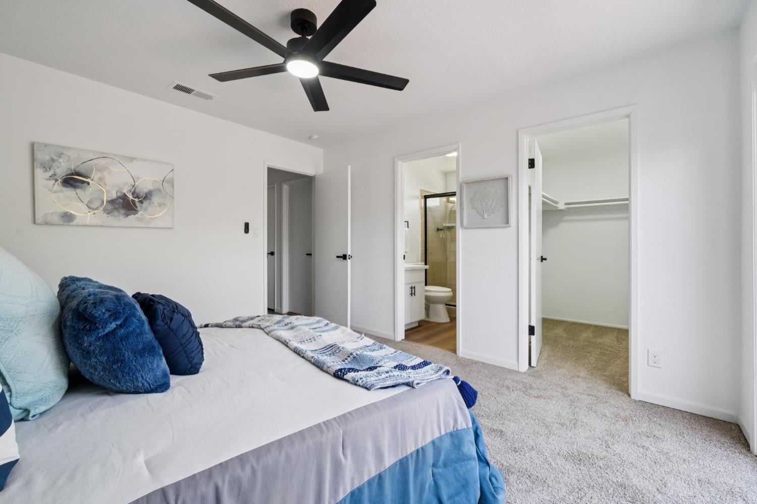 32402 Rutherford Lane Union City, CA 94587 - Photo 31 of 55 a bedroom with a bed and a painting on the wall