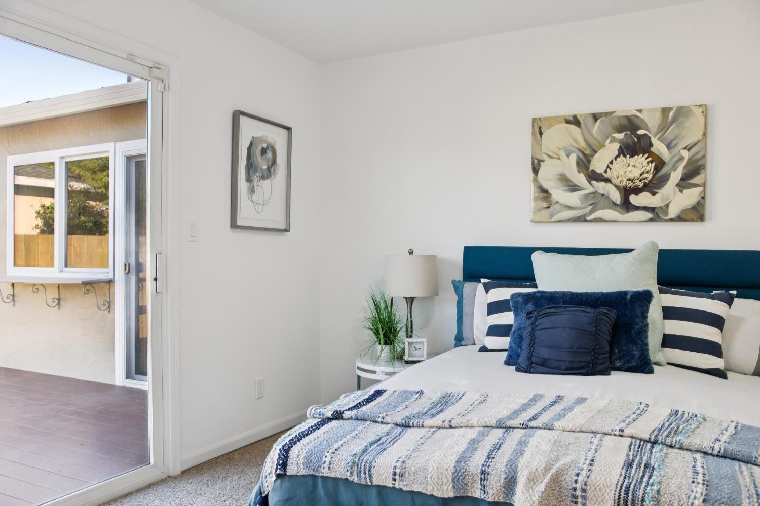 32402 Rutherford Lane Union City, CA 94587 - Photo 33 of 55 a bedroom with a bed and a painting on the wall