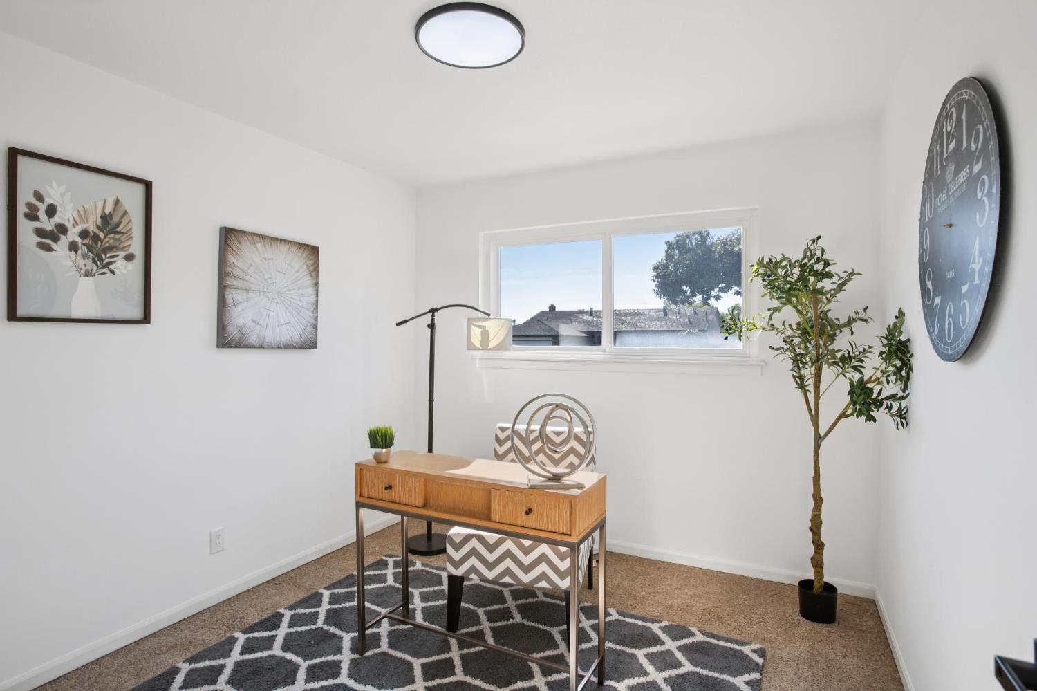 32402 Rutherford Lane Union City, CA 94587 - Photo 36 of 55 a view of a livingroom with furniture and a potted plant