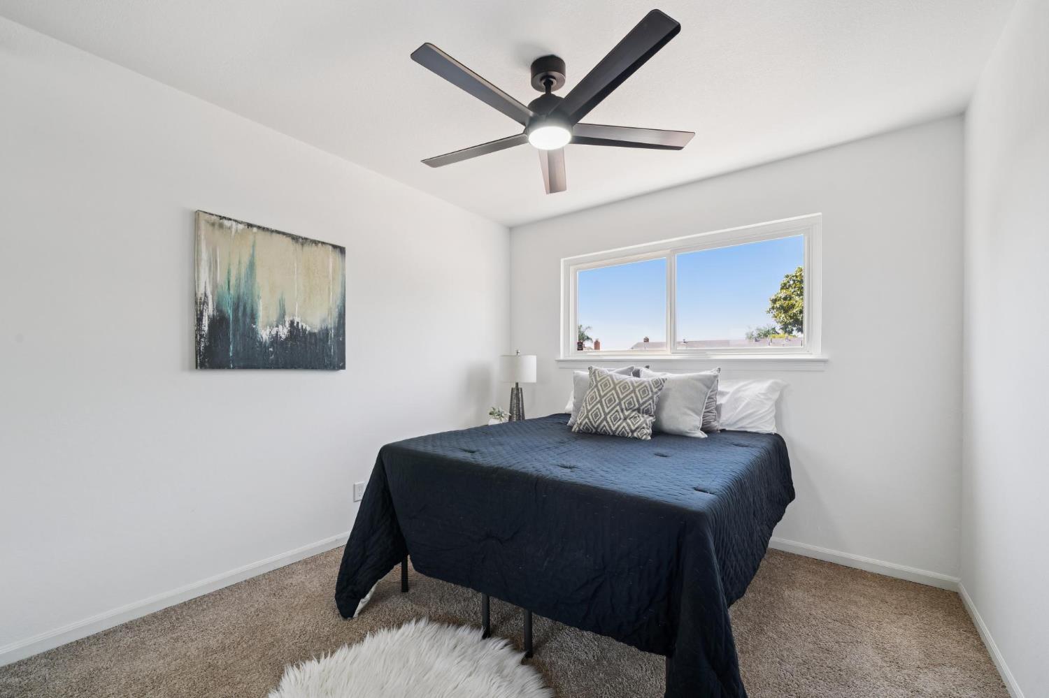 32402 Rutherford Lane Union City, CA 94587 - Photo 40 of 55 a bedroom with a bed and a table