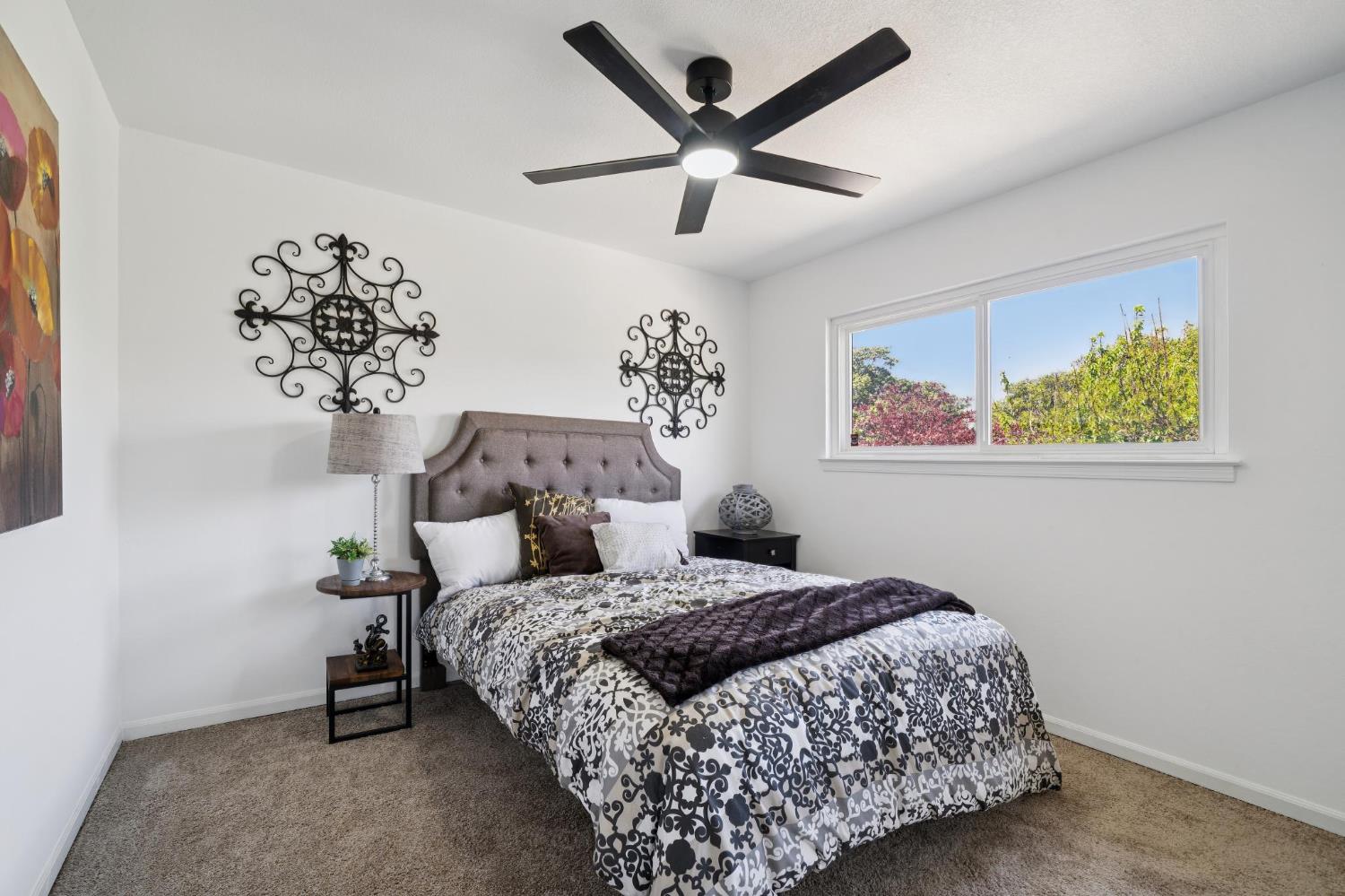 32402 Rutherford Lane Union City, CA 94587 - Photo 42 of 55 a bedroom with a bed and a chandelier