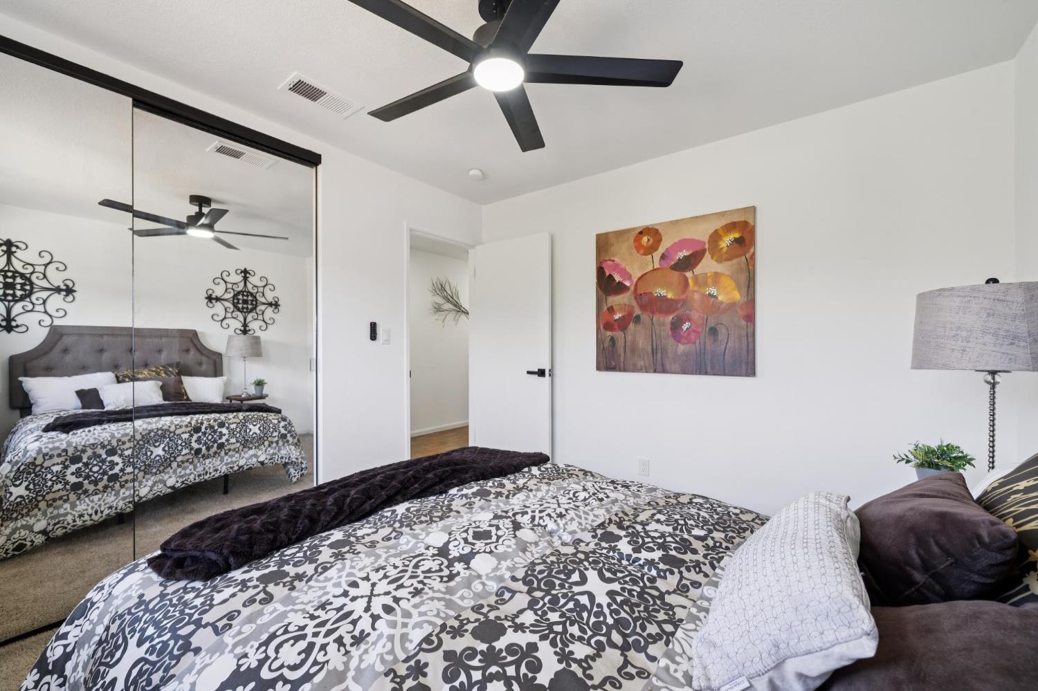 32402 Rutherford Lane Union City, CA 94587 - Photo 44 of 55 a bedroom with a bed and a painting on the wall