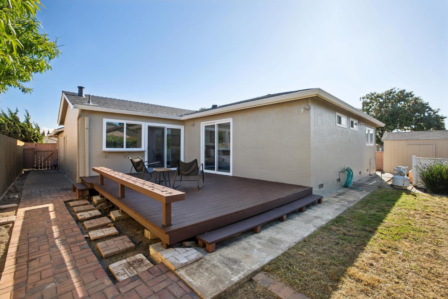 32402 Rutherford Lane Union City, CA 94587 - Photo 49 of 55 a front view of house with yard outdoor seating and covered with trees