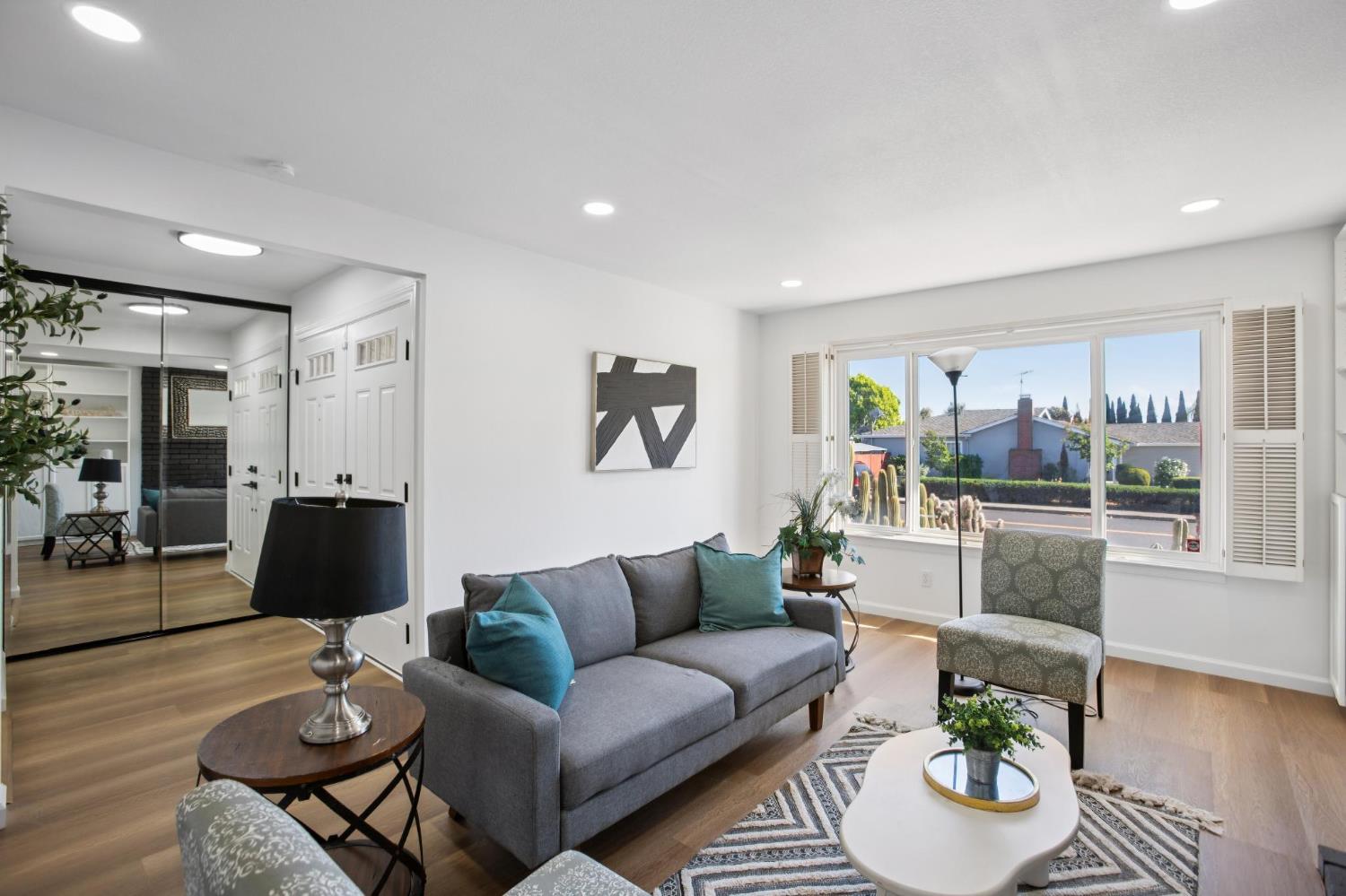32402 Rutherford Lane Union City, CA 94587 - Photo 10 of 55 a living room with furniture and a wooden floor