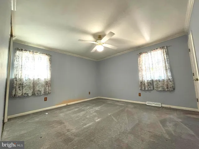 a kitchen with stainless steel appliances granite countertop a sink and dishwasher a stove top oven with wooden floor