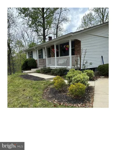 a black and white photo of a house