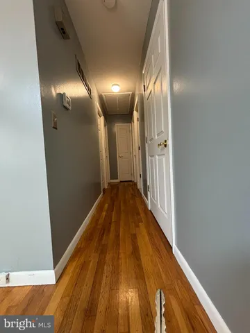 a bathroom with a sink and a shower curtain