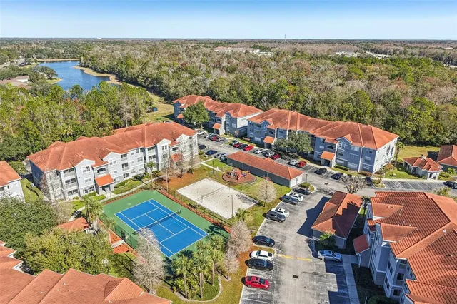 an aerial view of residential building with outdoor space