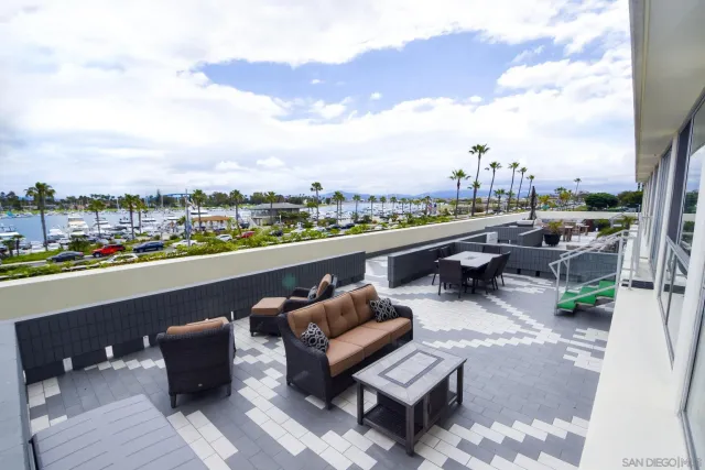 a view of city from terrace with seating space