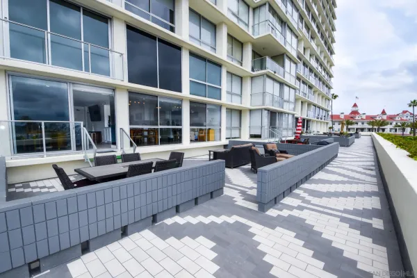 a view of a building with sitting area