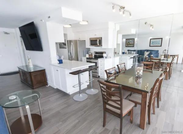 a view of kitchen with cabinets and wooden floor