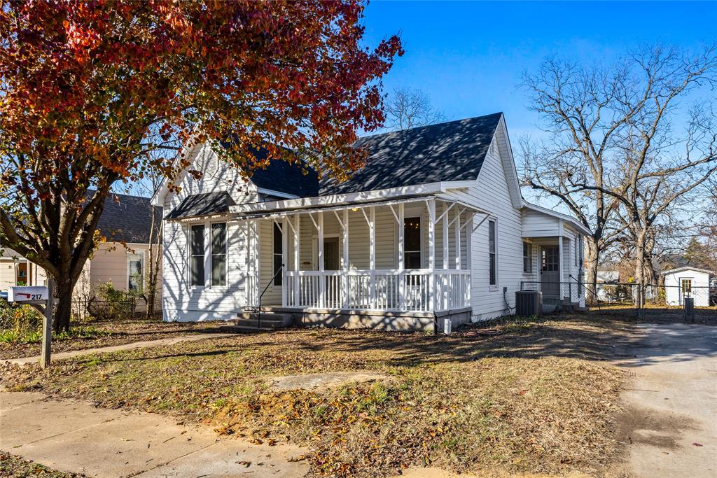 217 West Hull Street Denison, TX 75020 - Photo 1 of 1 a front view of a house with a yard