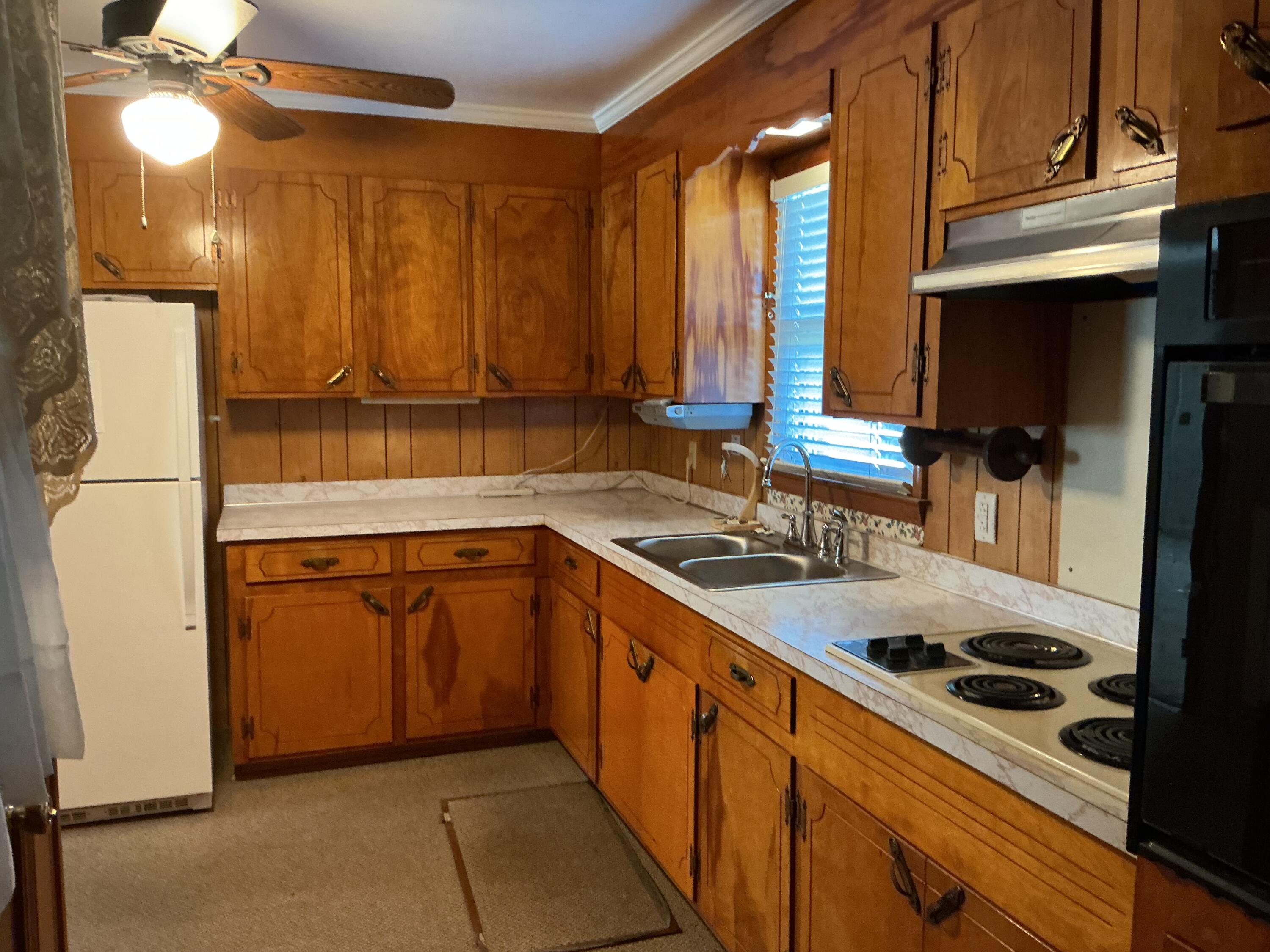 1385 Jefferson Road Sumter, SC 29153 - Photo 11 of 30 Kitchen has stove top, oven, and refrigerator stays
